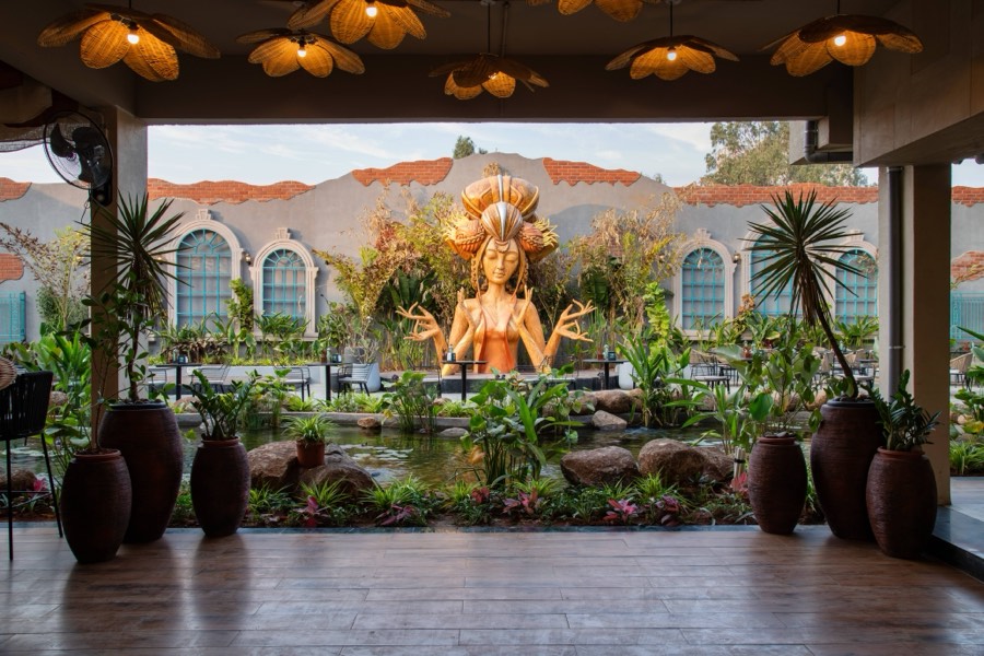 Golden lotus-lit dining pavilion